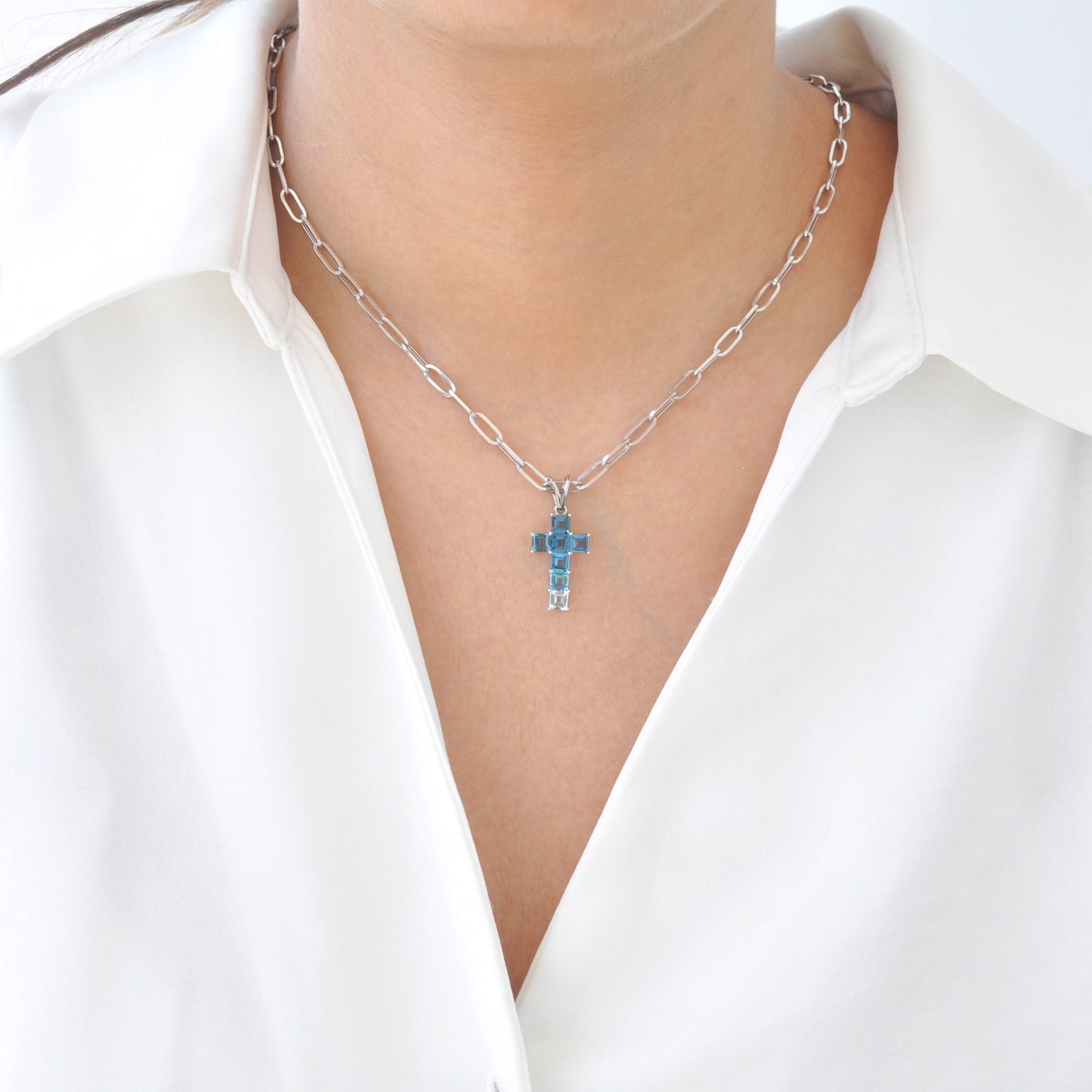 Linear Blue Topaz Cross Pendant