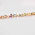 Rear view of the multi-gemstone bracelet, displaying the clean, comfortable 14K yellow gold link construction and smooth finish.