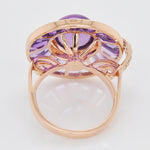 Back of the ring displaying the secure gemstone settings from the underside and the high-polish finish.