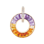 A gold-tone pendant with a circular design featuring tapered baguette-cut amethyst and citrine gemstones, with a diamond-encrusted bail.