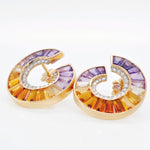 Elegant curved earrings featuring a seemless flow of amethyst to citrine baguettes with a sparkling diamond inner arc
