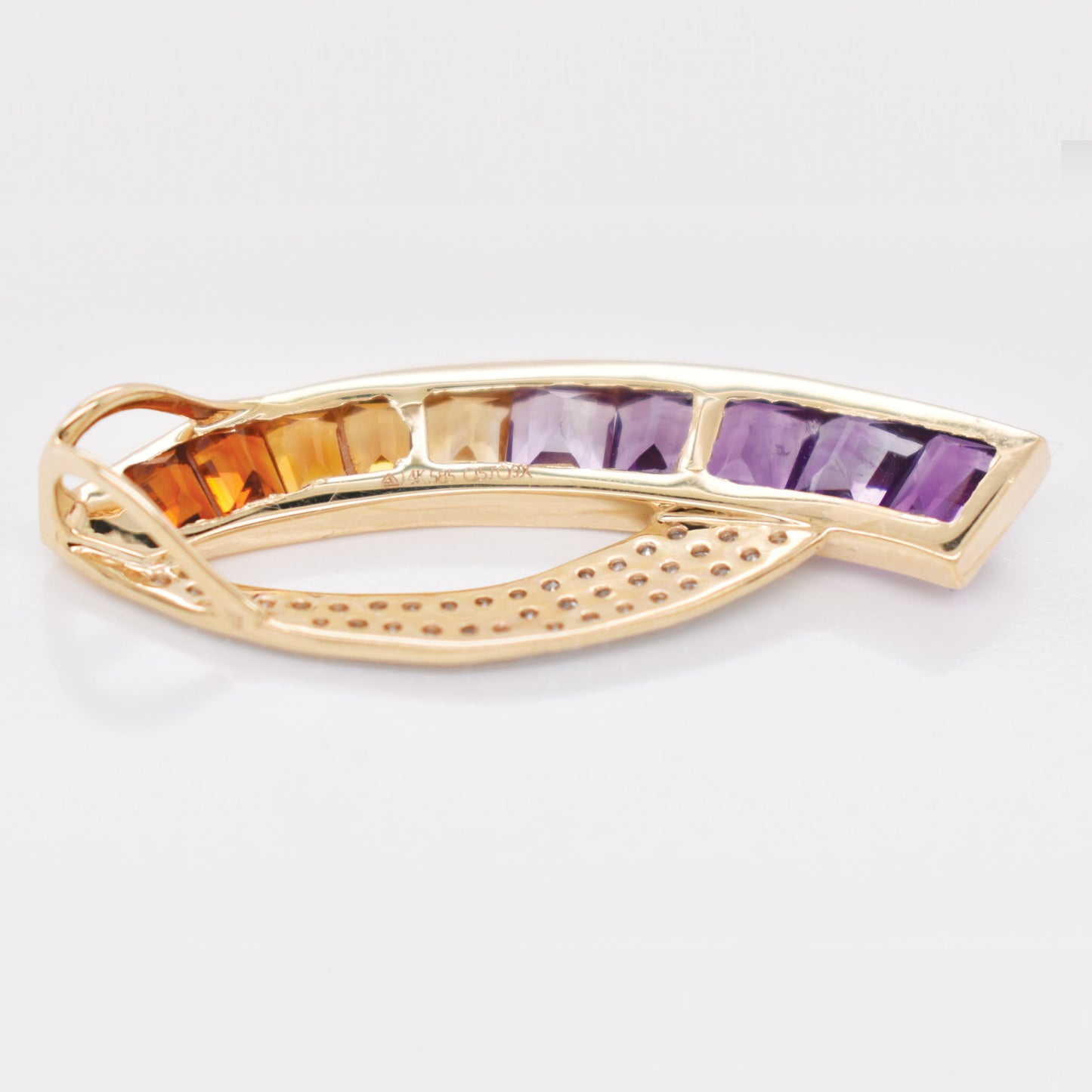 Designer ametrine earrings and pendant set by Vaibhav Dhadda – featuring sickle-shaped cuts and dual-tone gemstones.
