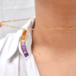 Fine jewelry set featuring crescent-shaped ametrine pendant and earrings from Vaibhav Dhadda, highlighting natural bi-color gemstones