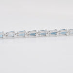 Close-up of the underside of the line bracelet to illustrate the flexible, fluid joints of the gemstone links.