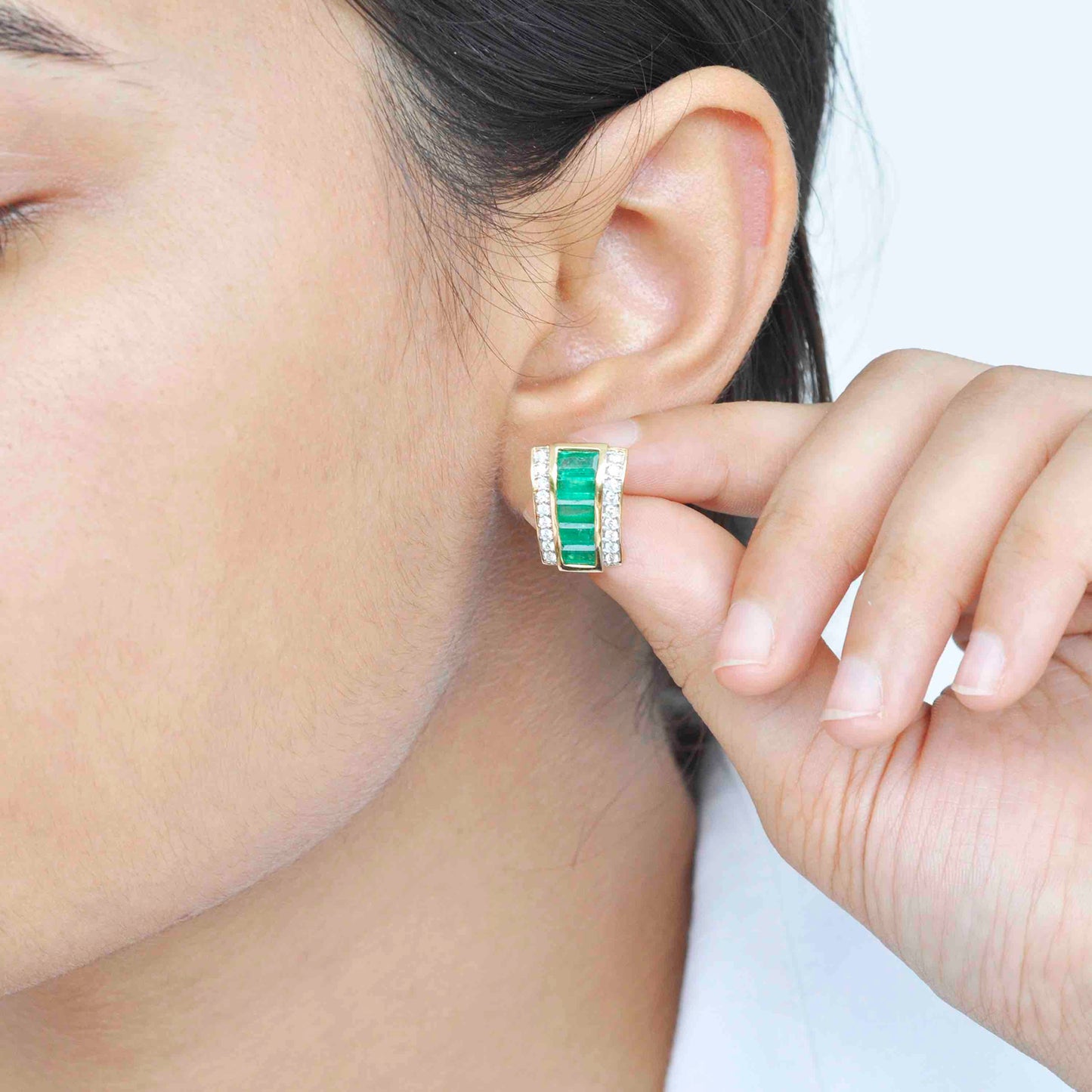 luxury emerald cut earrings yellow gold
