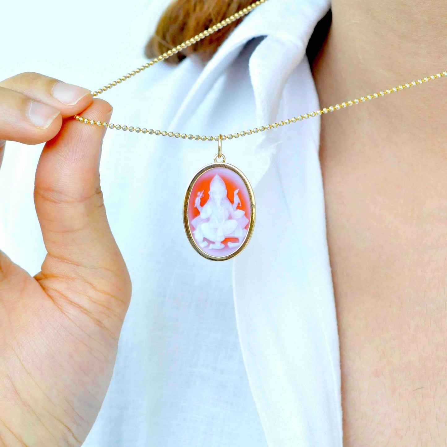 Cameo pendant with Ganesha carving and OM symbol in agate