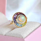 Unique Ethiopian opal ring with baguette circular design