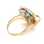 Back profile of luxury rotating gemstone statement ring