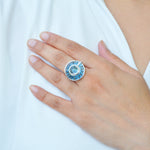 On-hand shot of the ring highlighting the sparkle of the gems.