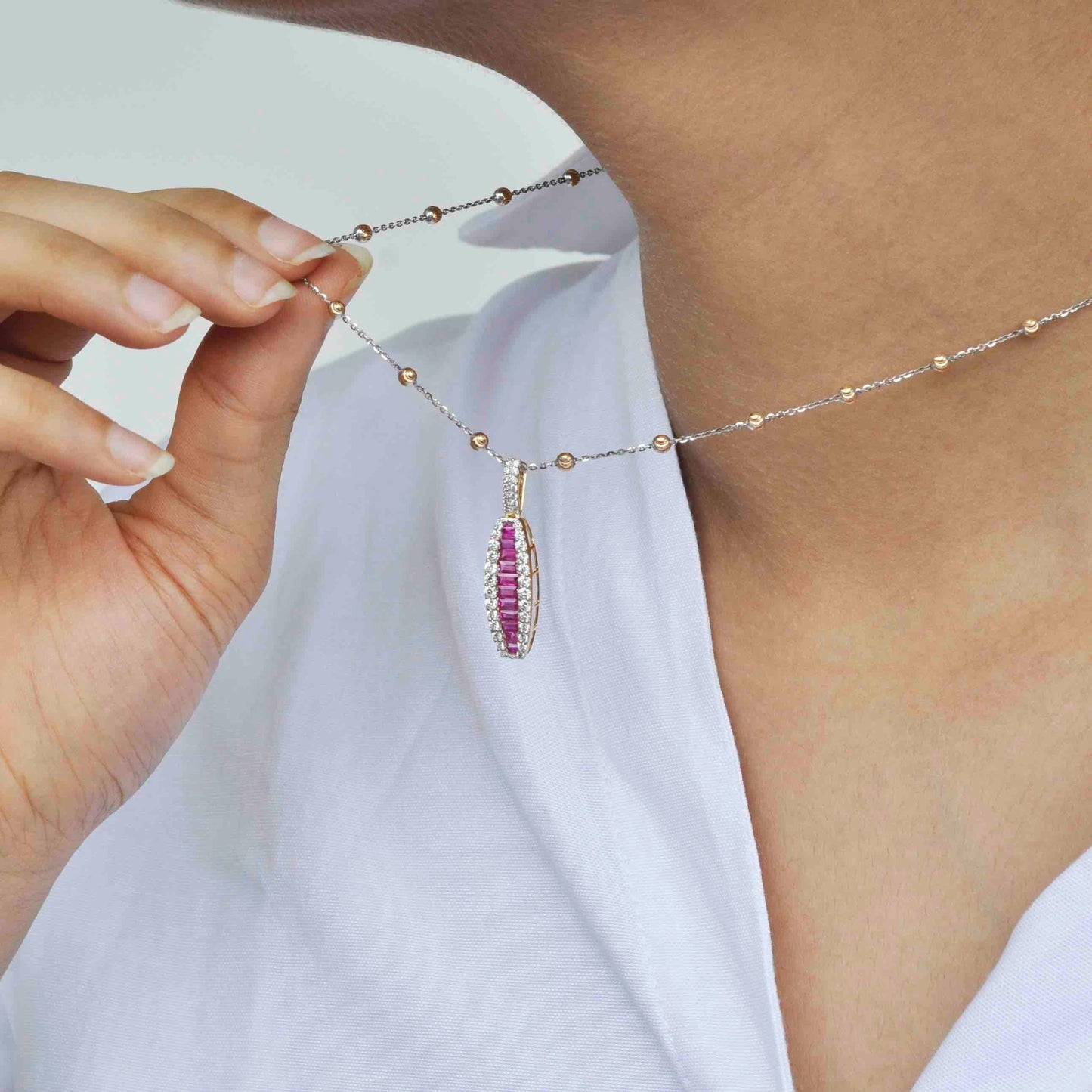 red gemstone pendant
