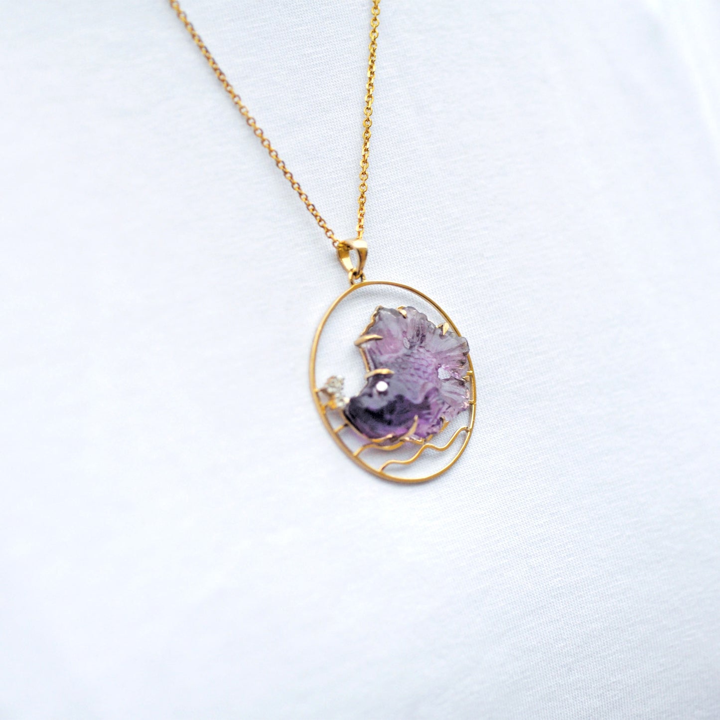 Hand Carved Amethyst Fish Pendant