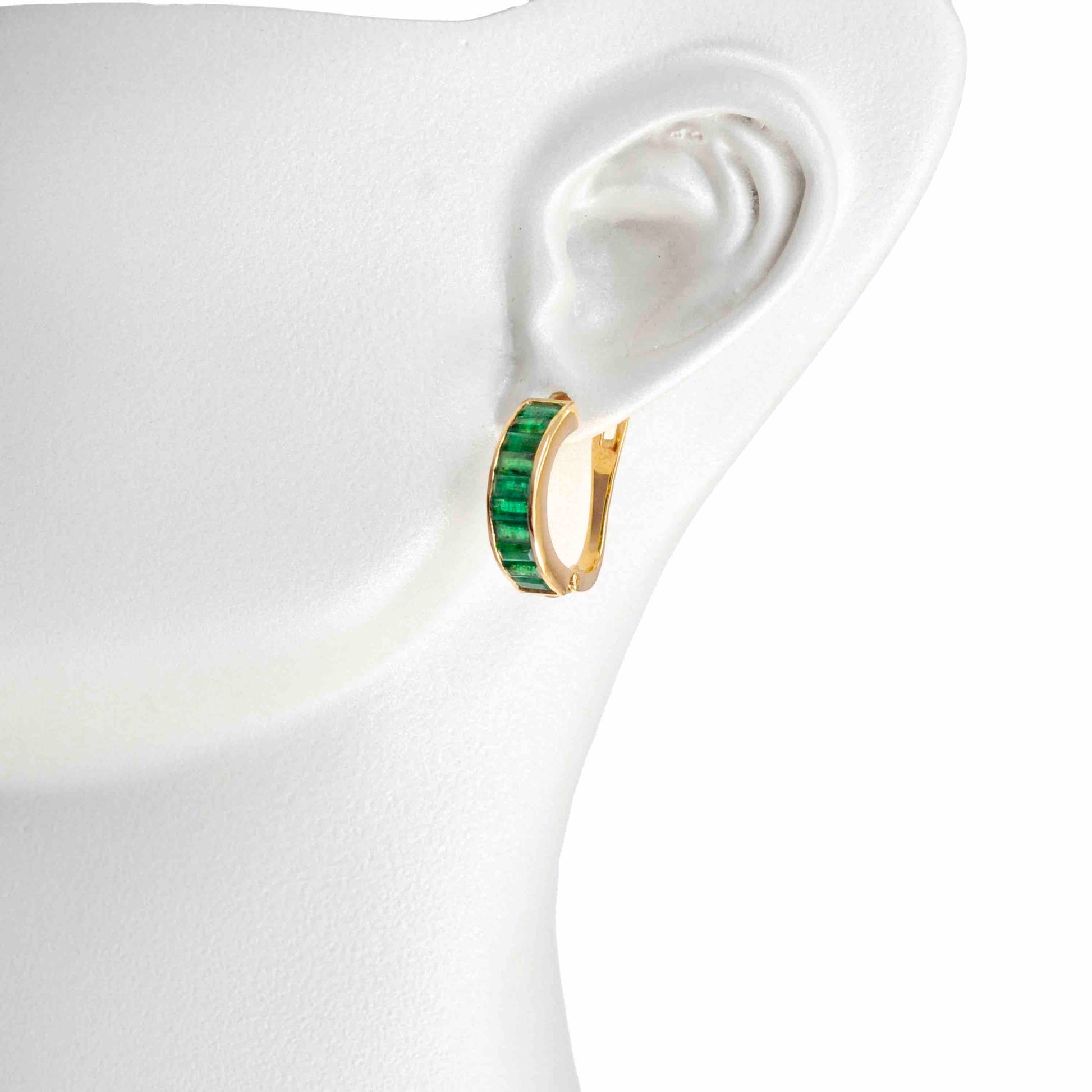 emerald huggie earrings