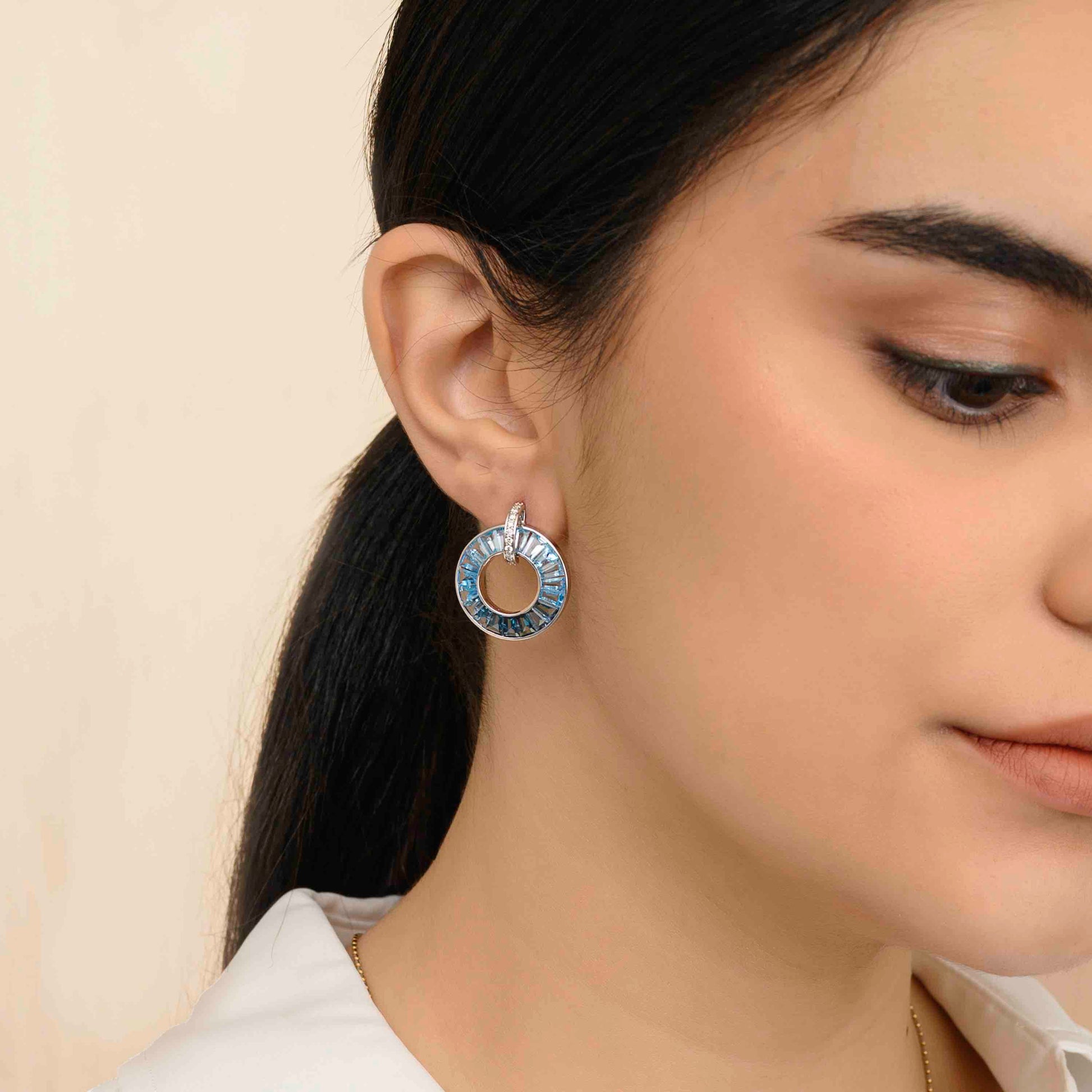 blue topaz earrings in white gold