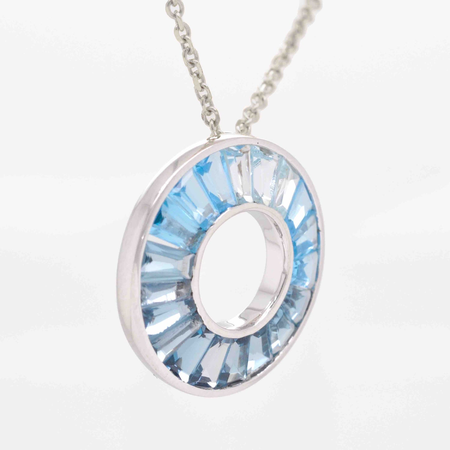 sky blue topaz pendant gold