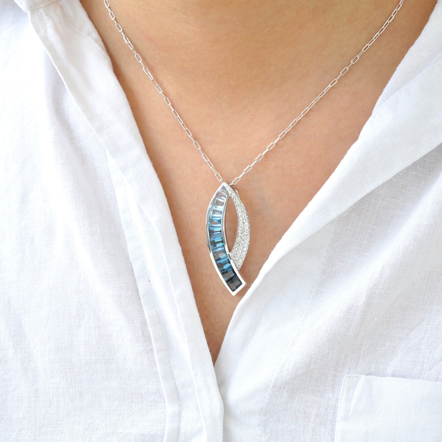 Sickle Blue Topaz Pendant