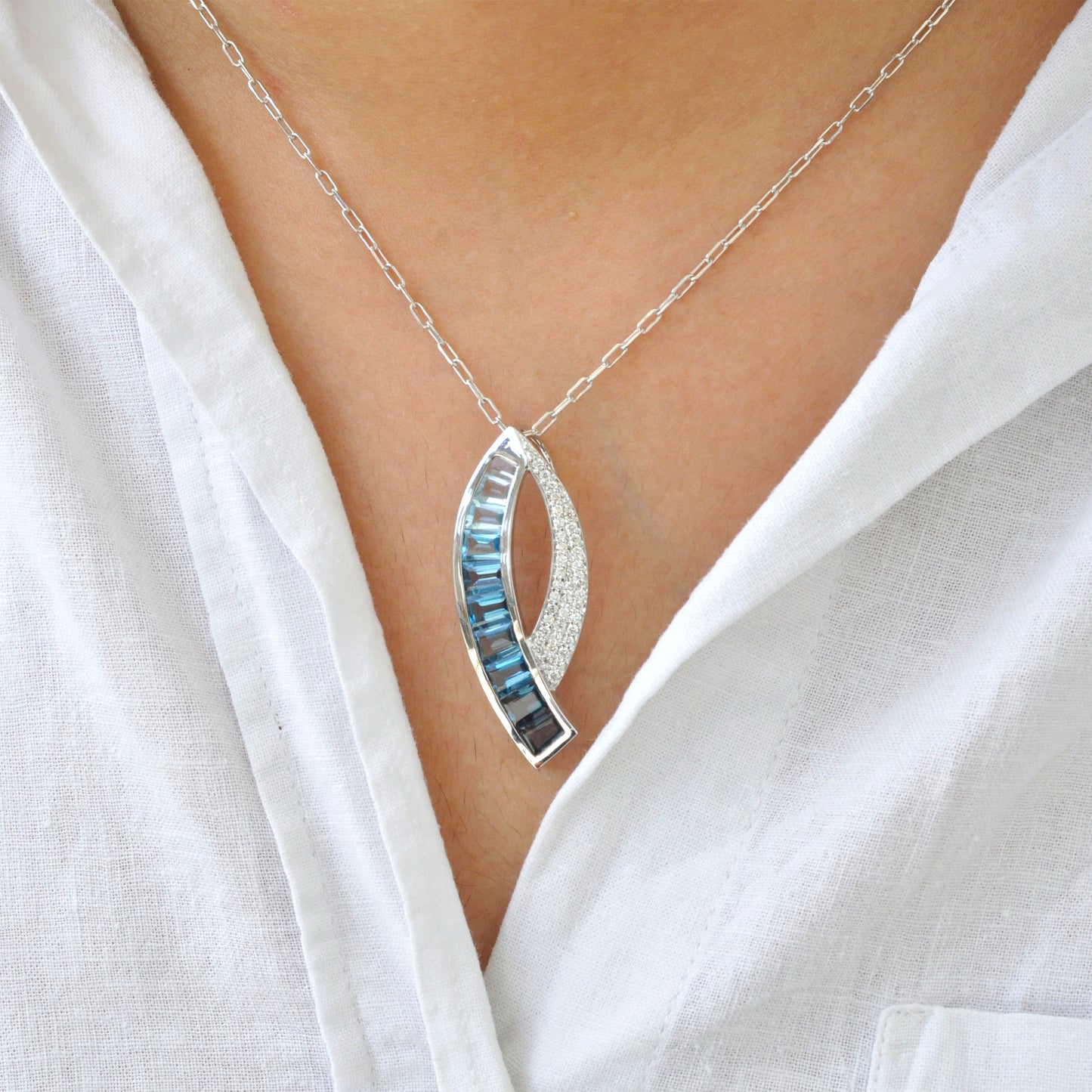 Sickle Blue Topaz Pendant