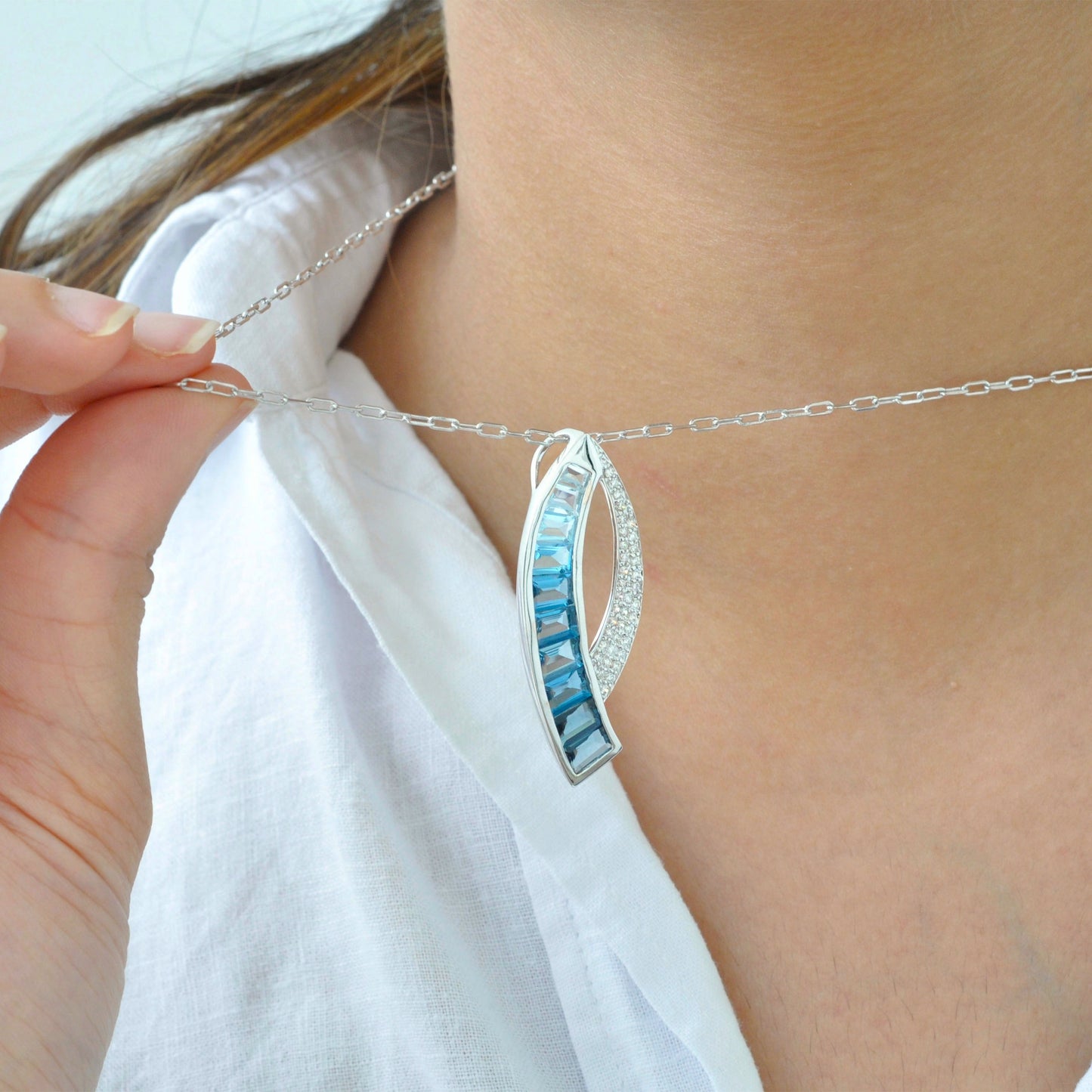 Sickle Blue Topaz Pendant