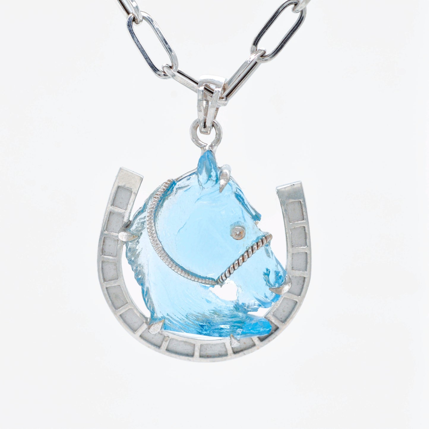 Hand-Carved Swiss Blue Topaz Horse Shoe Pendant