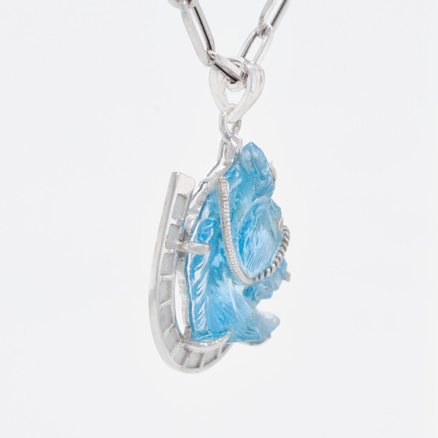 Hand-Carved Swiss Blue Topaz Horse Shoe Pendant