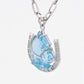 Hand-Carved Swiss Blue Topaz Horse Shoe Pendant