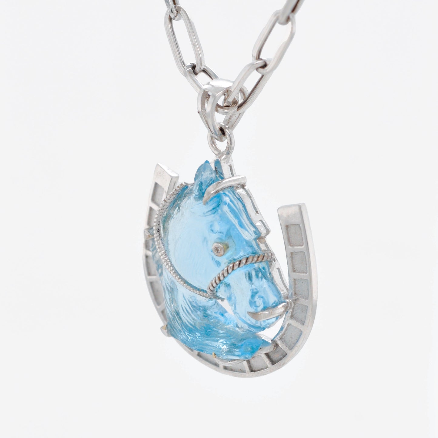 Hand-Carved Swiss Blue Topaz Horse Shoe Pendant