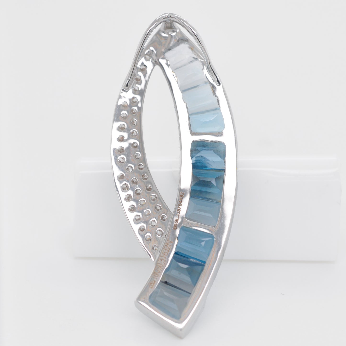 Sickle Blue Topaz Pendant