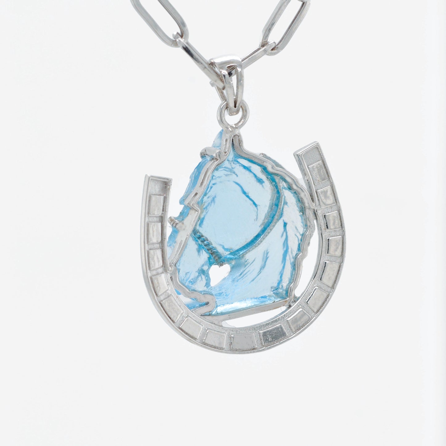 Hand-Carved Swiss Blue Topaz Horse Shoe Pendant