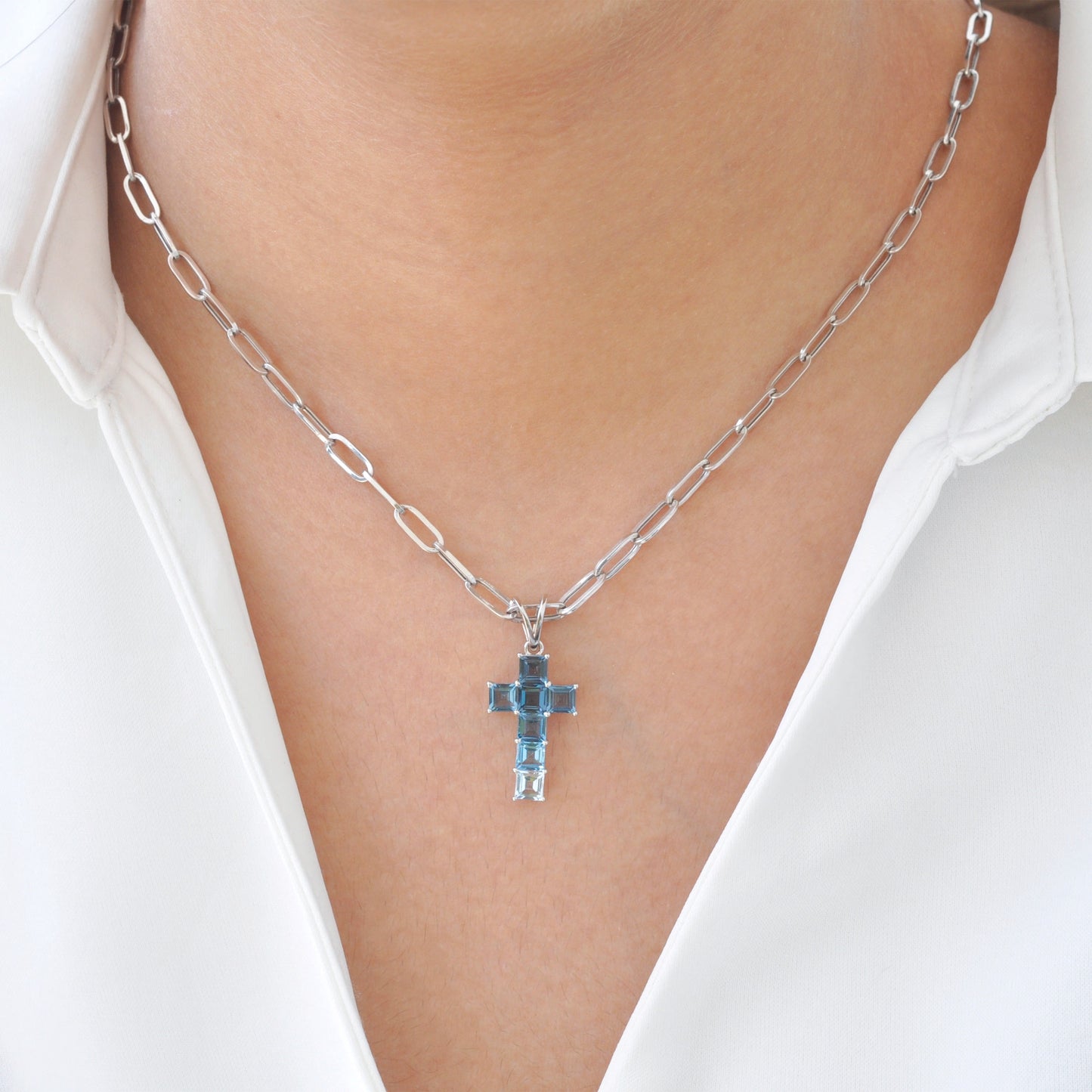 Linear Blue Topaz Cross Pendant
