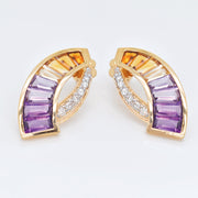Vaibhav Dhadda’s ametrine pendant and earrings in sickle form – modern luxury jewelry with purple-yellow dual tones