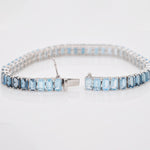 Close-up of the integrated box clasp and double-safety latch on the blue topaz bracelet.