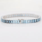 Detailed shot of the 14k white gold closure mechanism for the gemstone tennis bracelet.
