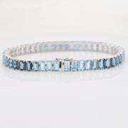 Detailed shot of the 14k white gold closure mechanism for the gemstone tennis bracelet.
