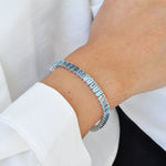 Model Wearing White Gold Blue Topaz Bracelet