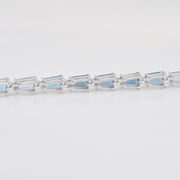 Close-up of the underside of the line bracelet to illustrate the flexible, fluid joints of the gemstone links.