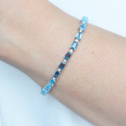 the white gold line bracelet worn as a statement piece
