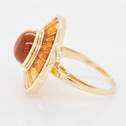 Close-up of the gemstone clarity and the high-polish finish of the 14K yellow gold mounting.