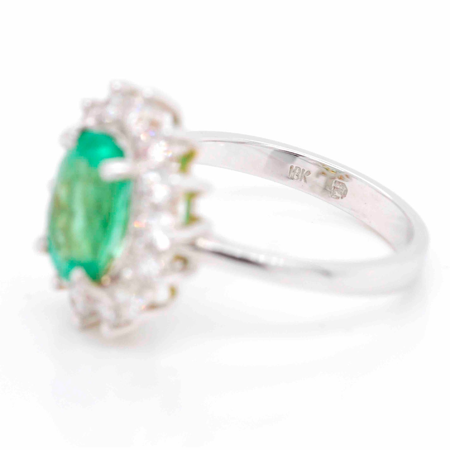 Columbian Emerald Diamond Ring with a stunning oval emerald and diamond accents
