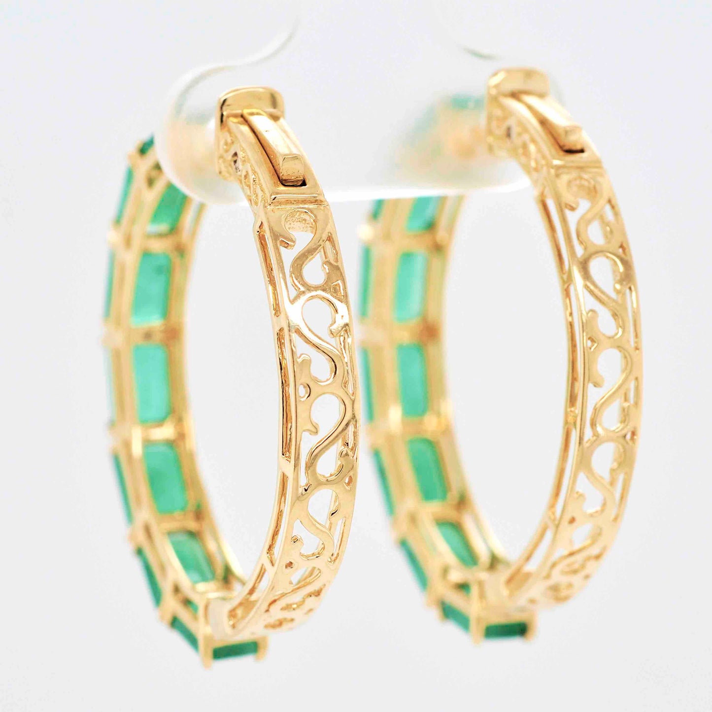 Handcrafted gold hoops with genuine emerald gemstones