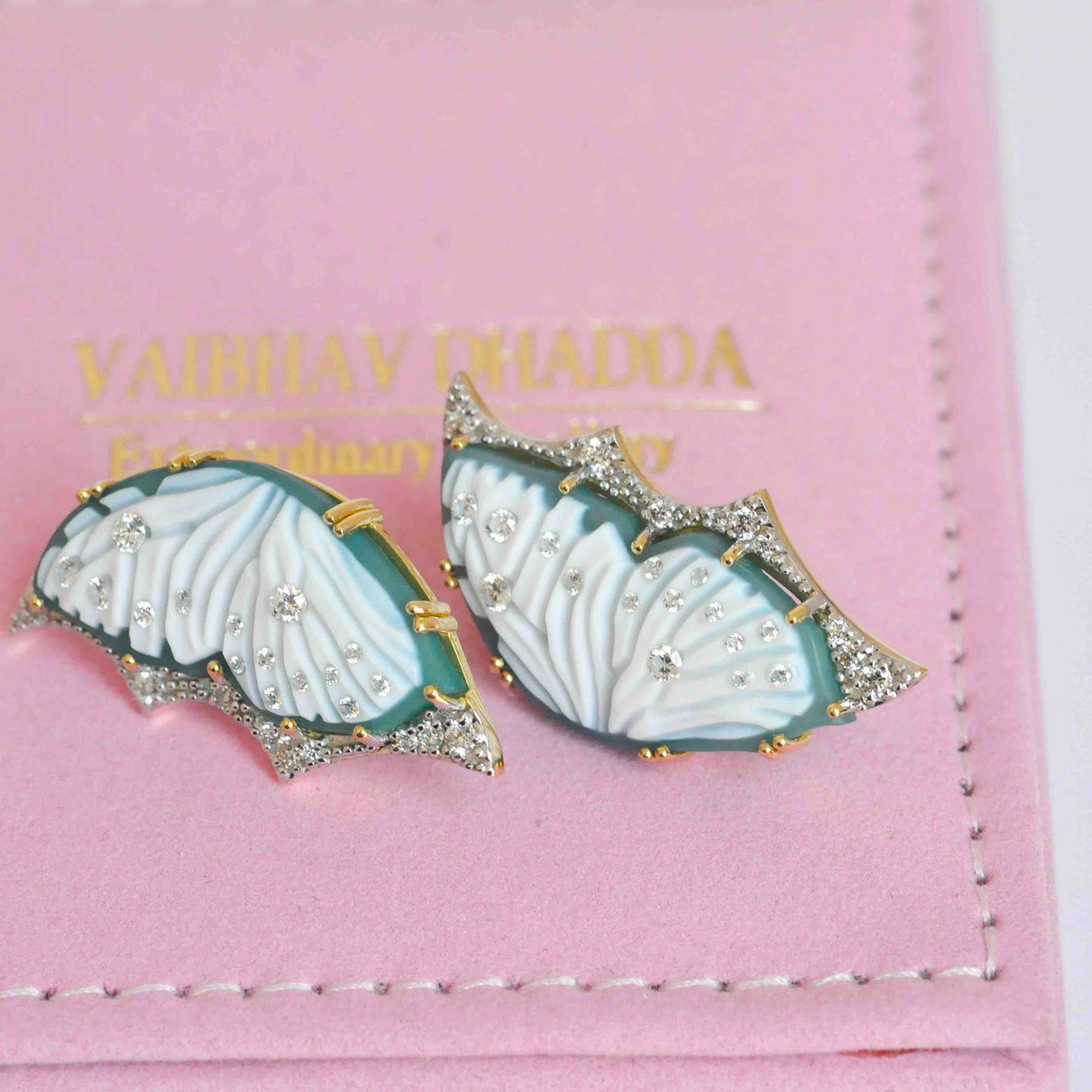 contemporary stud earrings with butterfly design
