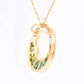 Green tourmaline baguette pendant necklace