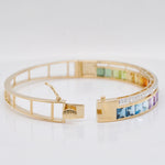 Close view showing the 14K yellow gold closure mechanism fully open and ready to be secured.