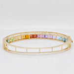 A shot of the reverse side of the polished yellow gold frame, emphasizing the durable construction of the jewelry piece.