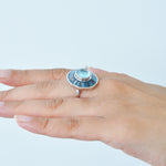 Lifestyle photo of the rotating ring showing its versatility as a statement piece.