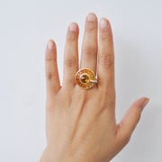 On-hand view of the 14K gold citrine ring showing its scale and appearance when worn as a cocktail piece.