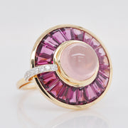 Macro detail focusing on the unique color contrast between the rose quartz and the vivid rhodolite.