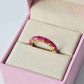 Eternity emerald ruby band with yellow gold