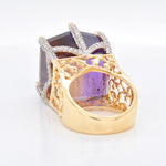 Underside of the ring head, revealing the back of the ring & hand carved taj mahal.