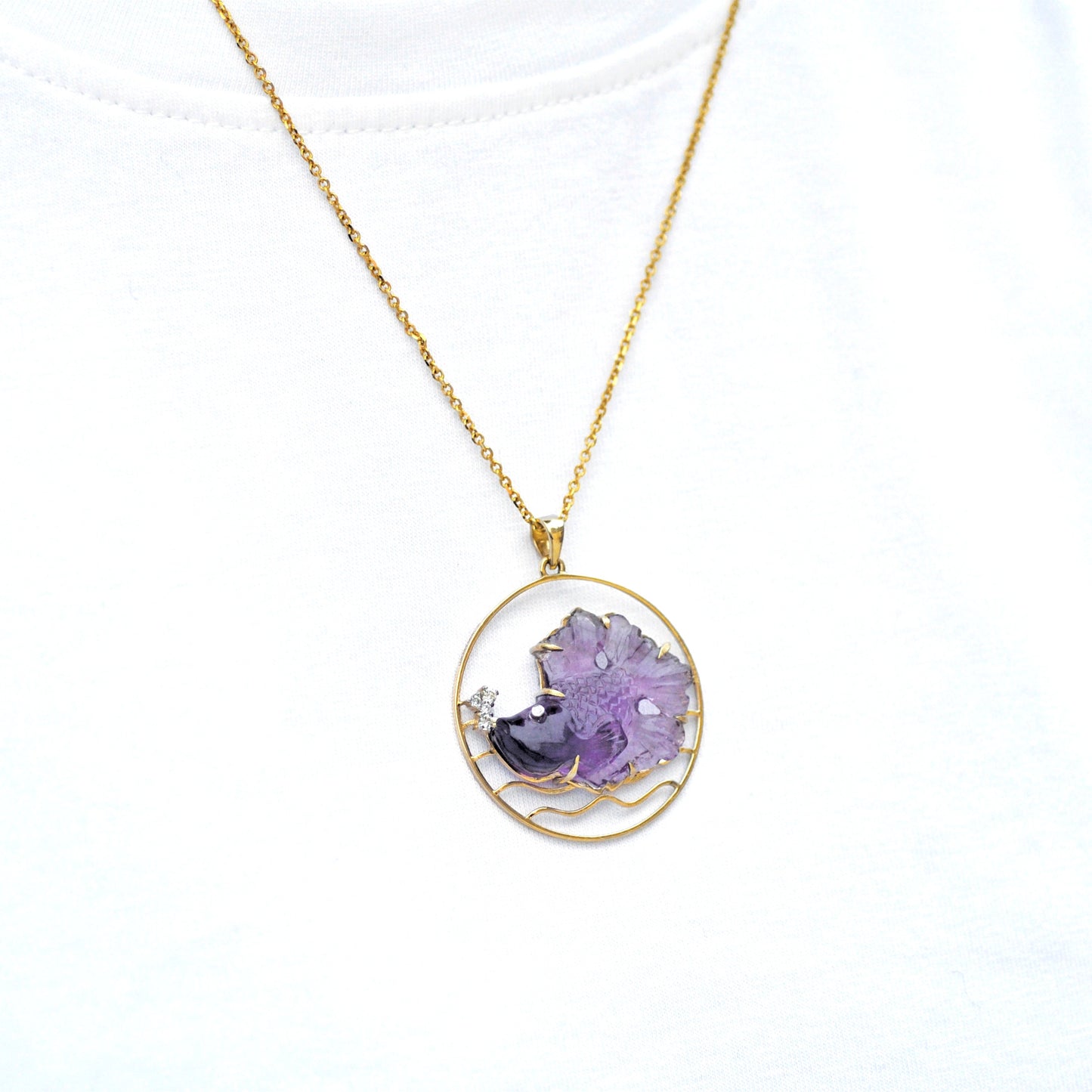 Hand Carved Amethyst Fish Pendant