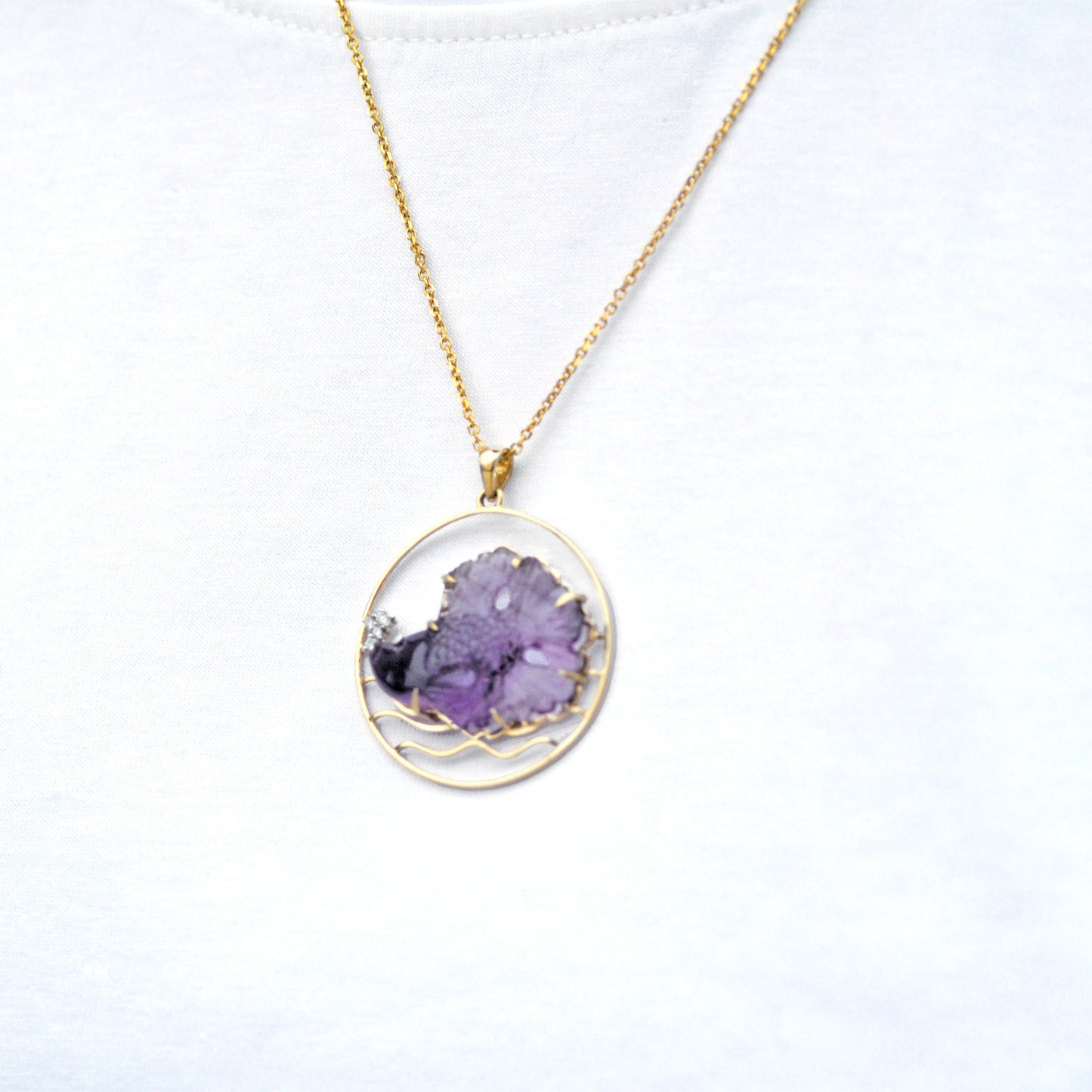 Hand Carved Amethyst Fish Pendant