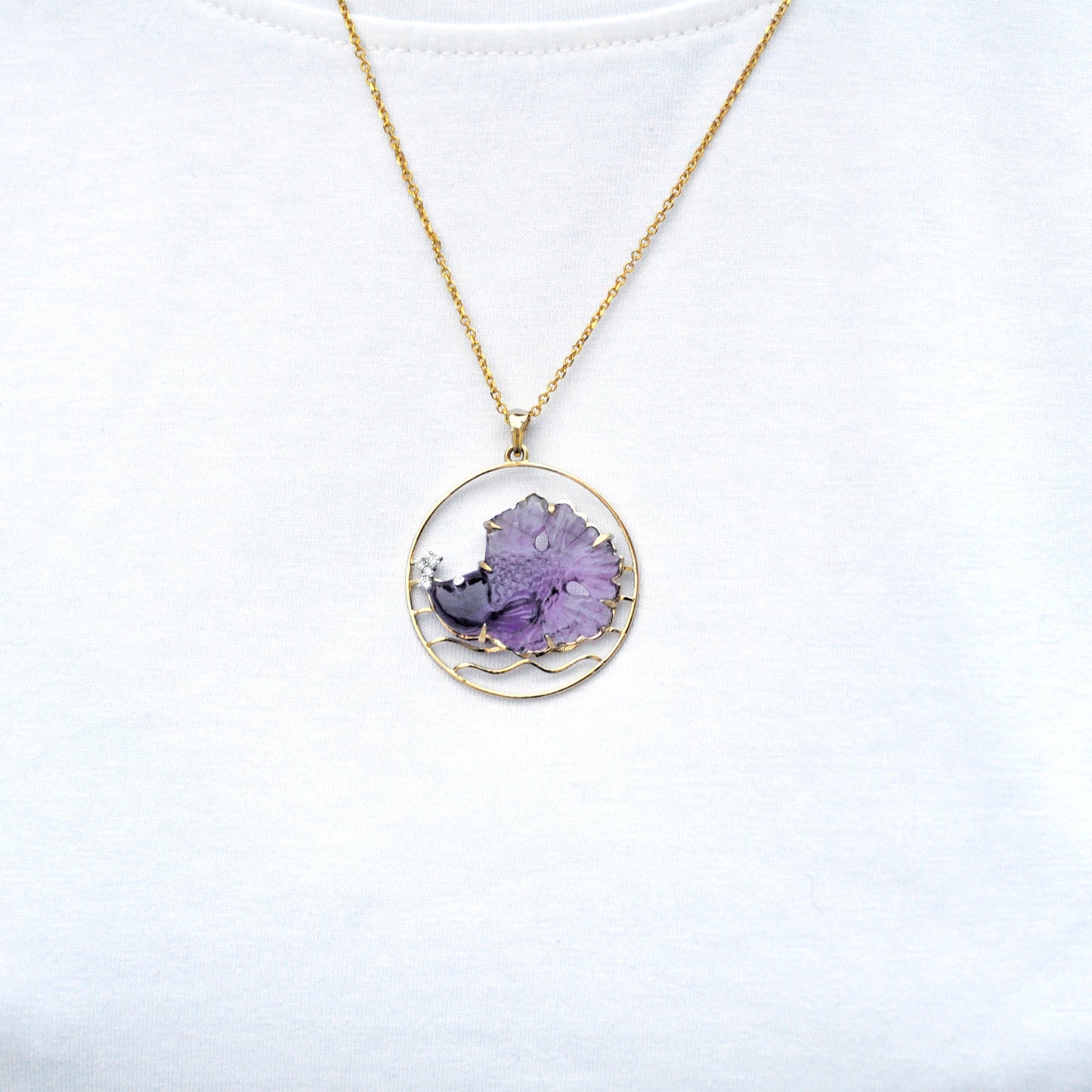 Hand Carved Amethyst Fish Pendant